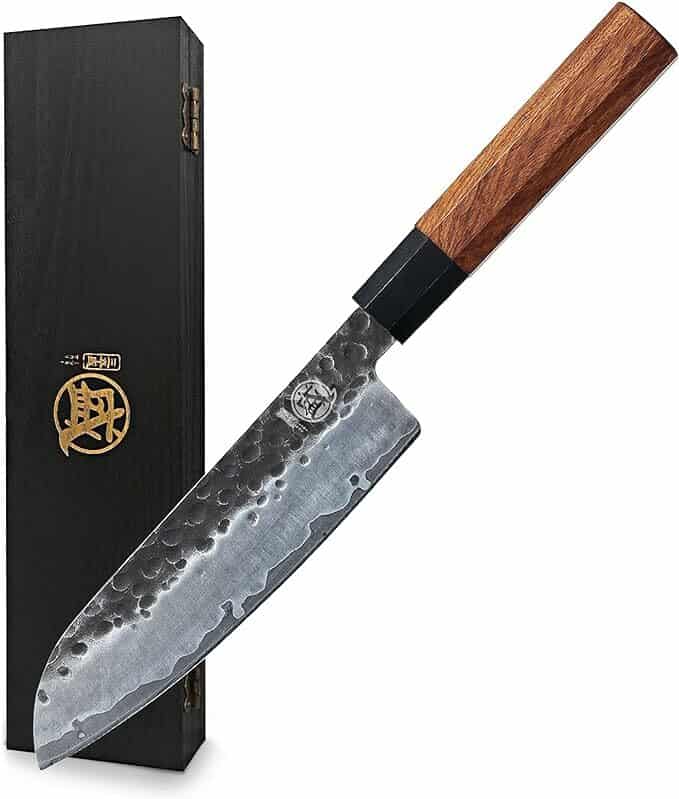 A japanese knife with a wooden handle and box.